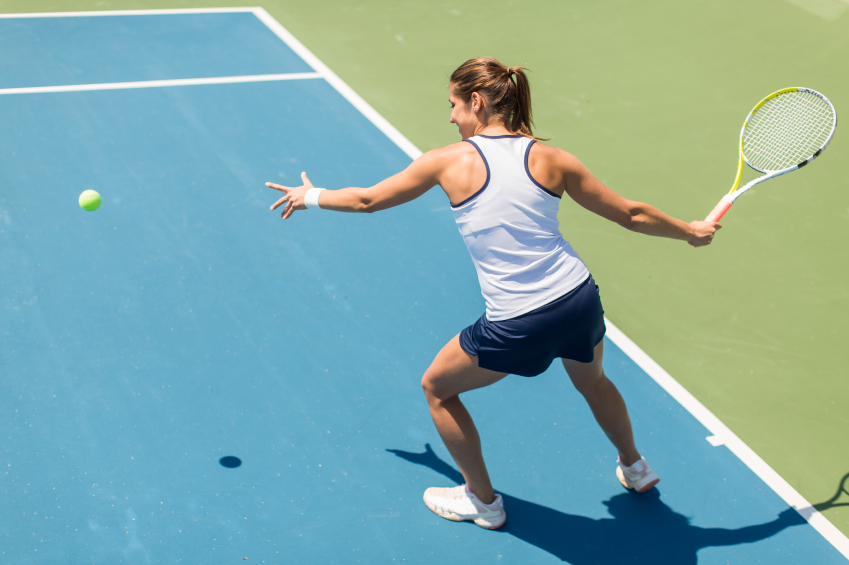 Young woman playing tennis