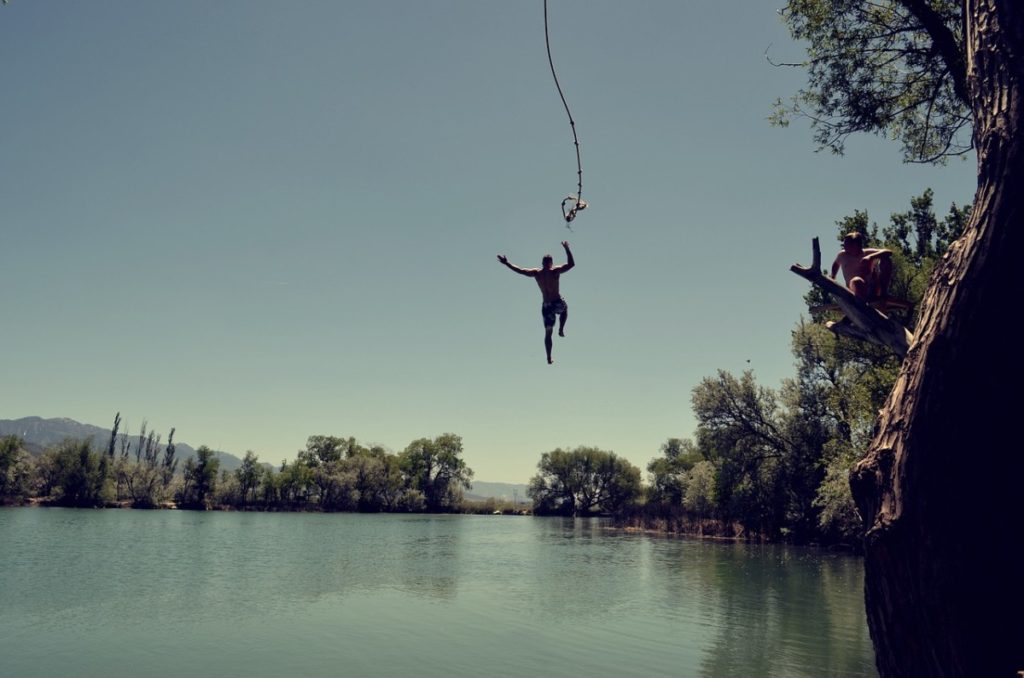 person jumping into water