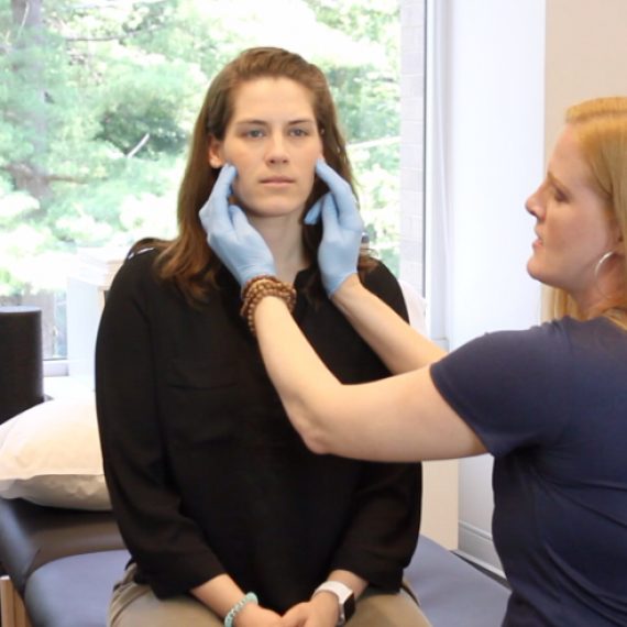 Physical therapist checking for TMD
